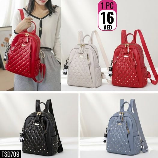 Trendy quilted bag pack with gold-tone studs and tassel charm - TSD709